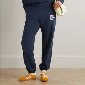 Sporty & Rich Athletic Club navy logo sweatpants